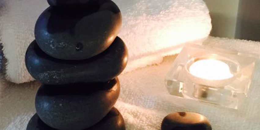 Evoke Salon Thunder Bay Hot Stone Massage